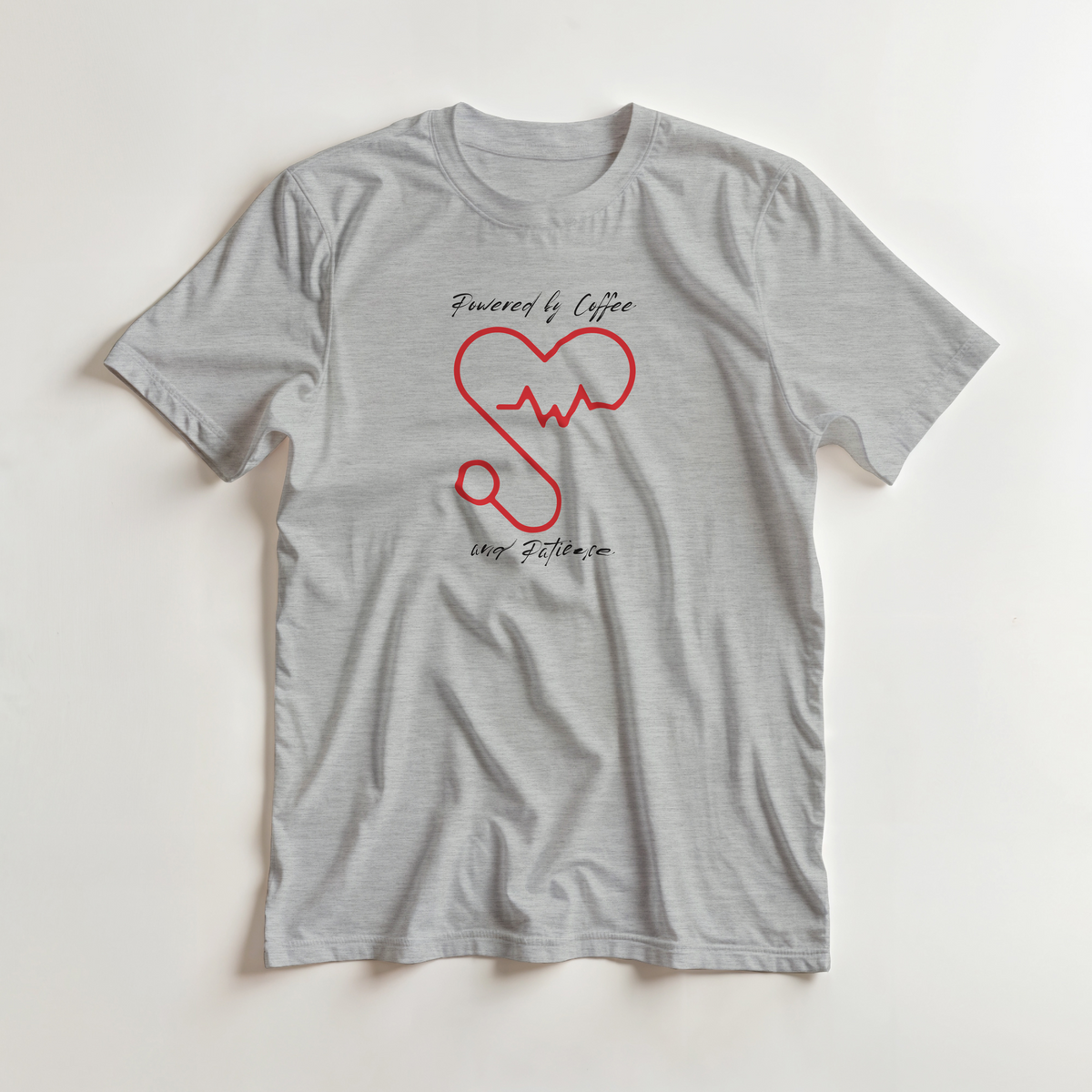 T-shirt girocollo Unisex " POWERED BY COFFEE AND PATIENCE "